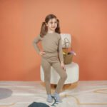 Combinaison seconde peau beige sable Dreamini portée par une fille